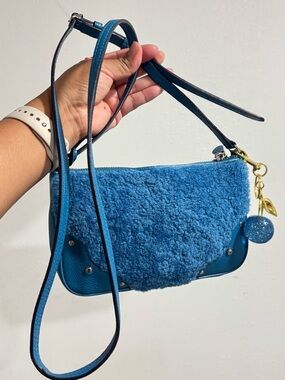 Coach Blue Faux Shearling Crossbody Bag with Gold Cherry Charm